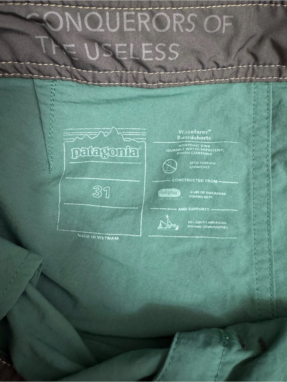 Patagonia Green Swim Board Shorts with Mustard Waistband and Blue Side Stripe
